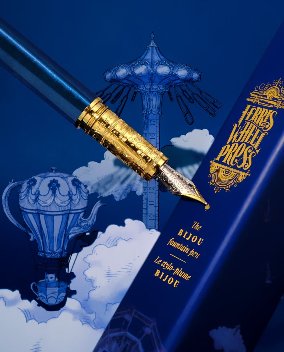 Sapphire blue fountain pen presented with a Ferris Wheel Press box. Wordkind.