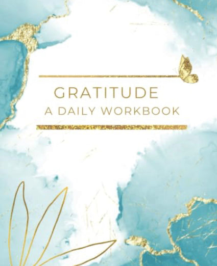 Journal with gold and teal marble on the cover and text Gratitude A Daily Workbook. Wordkind.